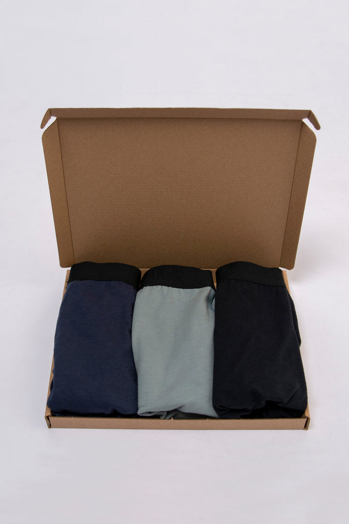 Akin Essentials Sustainable and eco-friendly men's underwear and briefs made of 100% organic cotton available in UK in Black, blue and tack along with a monthly subscription. Comes with eco-friendly compostable and recyclable packaging, plastic free 