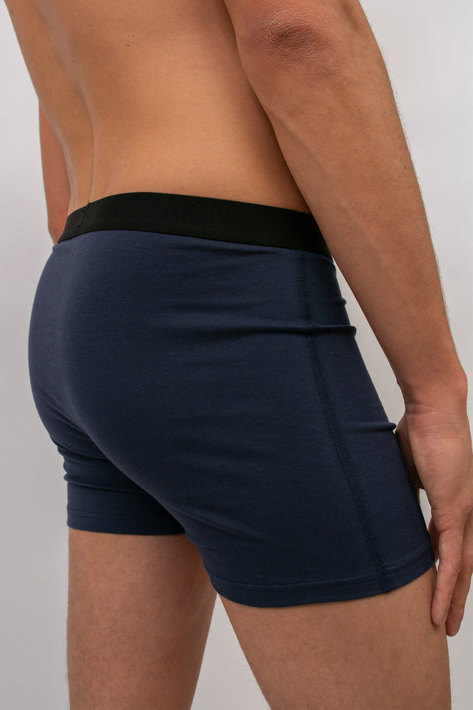 Akin Essentials Sustainable and eco-friendly men's underwear and briefs made of 100% organic cotton available in UK in Blue, comes with eco-friendly compostable and recyclable packaging, plastic free 
